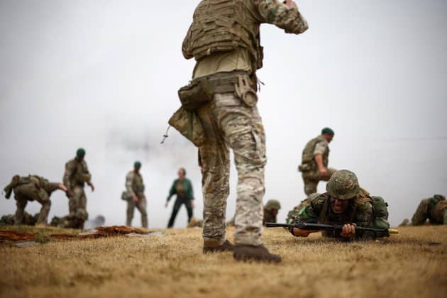 Ukraine Army recruits take part in a training session called "The battle of Innoculation training" with members of Britain's and other international partners' armed forces personnel, at a Ministry of Defence (MOD) training base in southern England on June 20, 2023.(Photo by HENRY NICHOLLS / AFP)