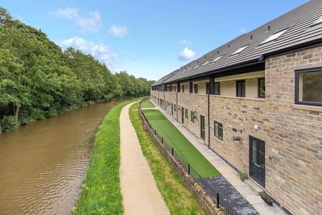 A two-bedroom apartment in this development by the canal in Skipton is for sale at £174,000 with Dale Eddison and comes with a lift, parking and a storage unit