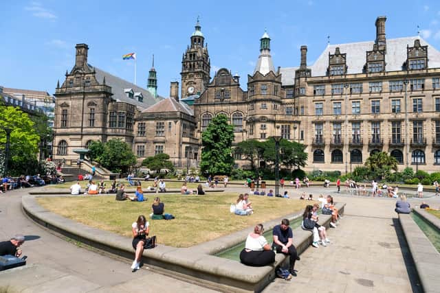 People at the Peace Gardens in Sheffield enjoying the sunshine. PIC: Dean Atkins