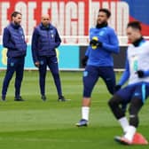 PLANNING AHEAD: England manager Gareth Southgate and coach Paul Nevin look on during Wednesday's training session at St. George's Park, Burton-on-Trent. Picture: Nick Potts/PA