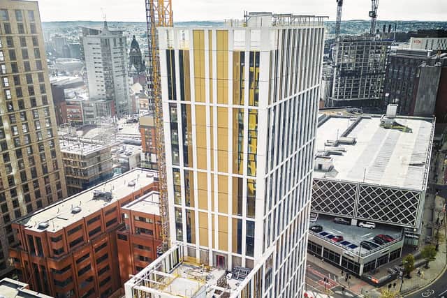 Construction of a new landmark 20-storey residential tower in Leeds has hit a major milestone after a topping out ceremony was held to mark it reaching its highest point.