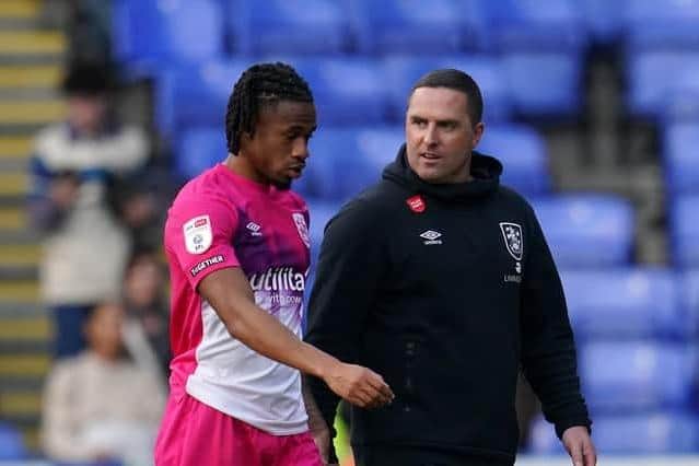 Huddersfield Town's David Kasumu (left) walking off alongside manager Mark Fotheringham after his dismissal in the recent Sky Bet Championship match at Reading. The midfielder is available again for the derby at Rotherham. Picture: Nick Potts/PA Wire.