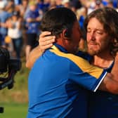 Tears of joy: Tommy Fleetwood of Team Europe celebrates with Jose Maria Olazabal, vice-captain, after clinching the Ryder Cup for the hosts (Picture:  Mike Ehrmann/Getty Images)