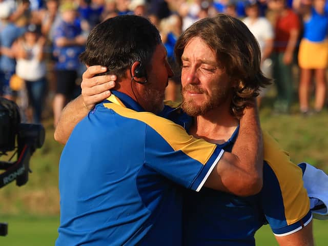 Tears of joy: Tommy Fleetwood of Team Europe celebrates with Jose Maria Olazabal, vice-captain, after clinching the Ryder Cup for the hosts (Picture:  Mike Ehrmann/Getty Images)