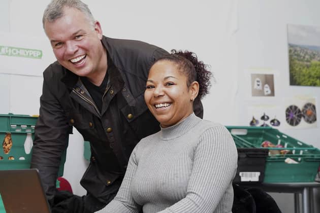 Technology entrepreneur David Richards with local resident Shaneeka Wilson. David is backing the Dryden project, a partnership that will deliver free,family friendly internet services to families across Southey in Sheffield. Picture Scott Merrylees
