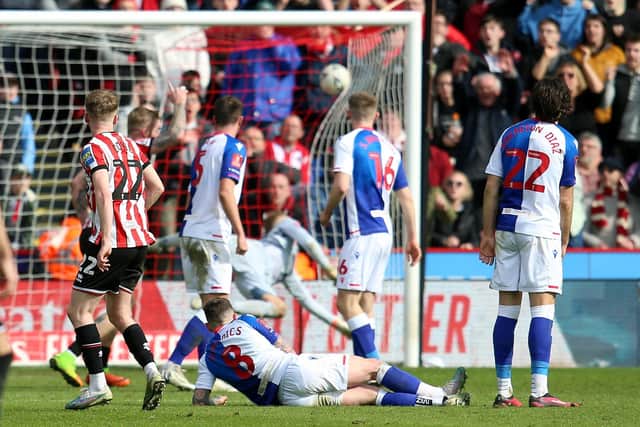 WINNER: Sheffield United's Tommy Doyle watches his winning goal on its way to the back of the net