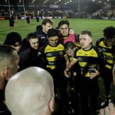 Liam Harris, who misses out through injury this week, leads a huddle after York's famous victory over Hull KR. (Photo: Allan McKenzie/SWpix.com)