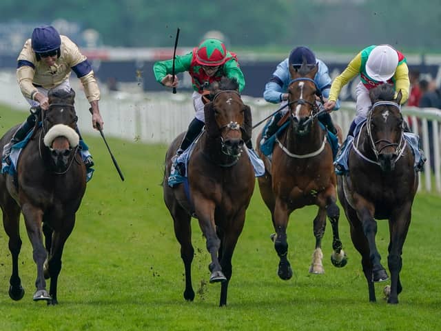 William Buick riding Mill Stream (R, white cap)) win The 1895 Duke Of York Clipper Stakes at York Racecourse on May 15, 2024 in York, England. (Picture: Alan Crowhurst/Getty Images)