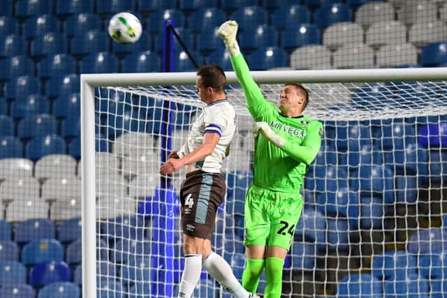 PUNCHY: Ethan Horvath beats Kieran Green to the ball (Image: Steve Ellis)
