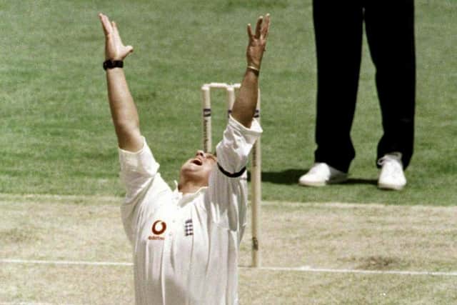 Darren Gough raises his hands to the heavens in memory of his late grandfather after trapping Justin Langer lbw on day one of the 1998-99 Ashes series in Brisbane. (Picture: AP Photo/Sporting Pix)