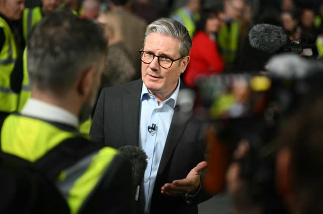 Prime Minister Sir Keir Starmer speaks with members of the media during a visit to Camira Manufacturing Facility in Holmfirth. PIC: Oli Scarff/PA Wire