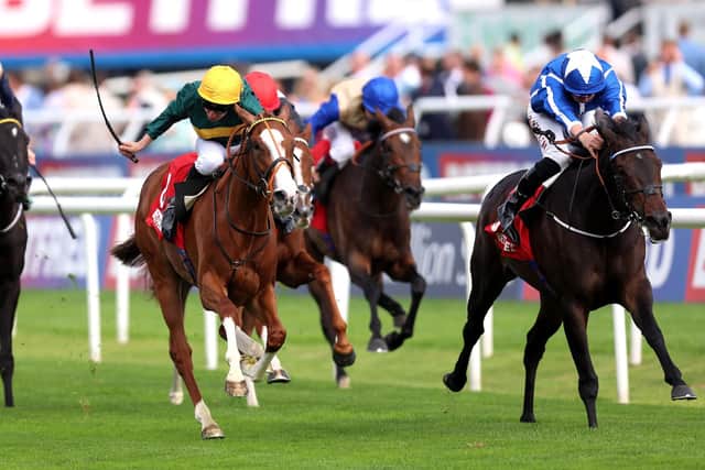Santorini Star ridden by Tom Marquand (right) wins the Betfred Park Hill Fillies' Stakes during Ladies Day of the Betfred St Leger Festival 2025 at Doncaster racecourse. Picture: Nigel French/PA