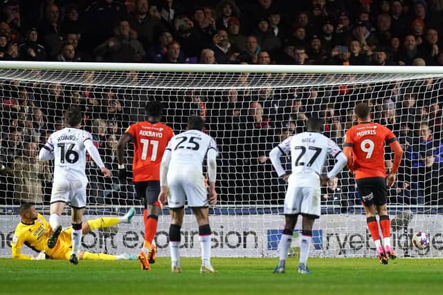 DECISIVE MOMENT: Luton Town's Carlton Morris (right) scores his side's second goal of the game against Middlesbrough at Kenilworth Road, Luton. Picture: Adam Davy/PA