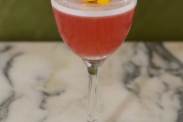 It's a take on a cosmopolitan but with Haku Vodka, white peach, passionflower, cranberry and lemon oil