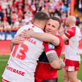 Willie Peters embraces captain Elliot Minchella after the win over St Helens. (Photo: Alex Whitehead/SWpix.com)