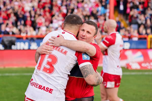 Willie Peters embraces captain Elliot Minchella after the win over St Helens. (Photo: Alex Whitehead/SWpix.com)