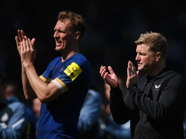 CONFRONTED: Newcastle United manager Eddie Howe, pictured right with defender Dan Burn