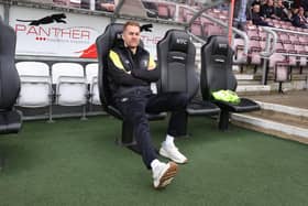 NORTHAMPTON, ENGLAND - APRIL 22: Harrogate Town manager Simon Weaver relaxes prior to the Sky Bet League Two between Northampton Town and Harrogate Town at Sixfields on April 22, 2023 in Northampton, England. (Photo by Pete Norton/Getty Images)