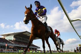 Derek Fox rides Corach Rambler to victory in the Randox Grand National at Aintree Racecourse on April 15, 2023 (Picture: Michael Steele/Getty Images)