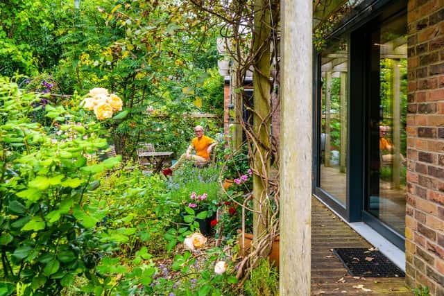 Architect Phil Bixby in his nature friendly garden