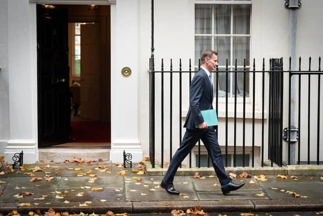 Chancellor of the Exchequer Jeremy Hunt leaves 11 Downing Street, London, for the House of Commons to deliver his autumn statement.