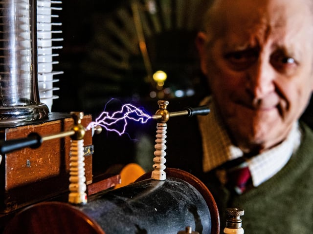 Owner of the Museum of Victorian Science, Anthony Swift watches the induction coil spark with electricity in his tiny attraction at the rear of his property. It has a rating of five stars with 365 reviews.