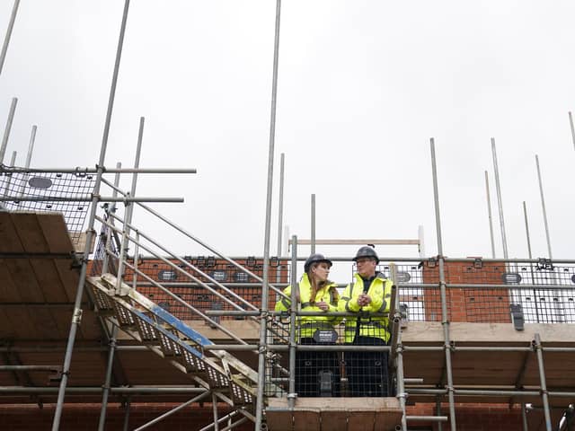 Labour leader Sir Keir Starmer and deputy leader Angela Rayner during a visit to a housing development. PIC: Joe Giddens/PA Wire