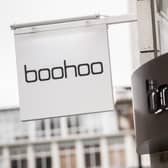 Online fashion firm Boohoo has warned that full-year sales could tumble by up to 17 per cent as under-pressure shoppers cut back. (Photo by PA)
