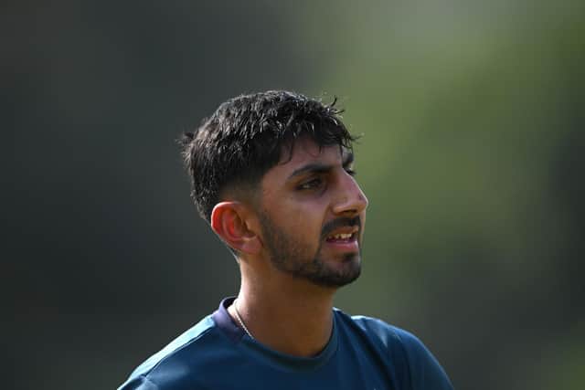 Newcomer Shoaib Bashir looks on during practice. Photo by Stu Forster/Getty Images.