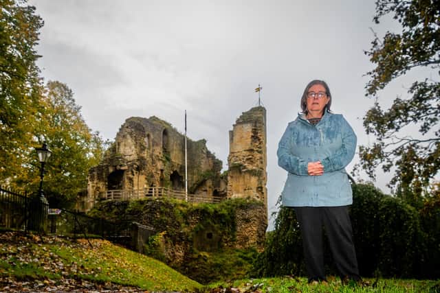 Author Jackie Glew, of Boroughbridge, North Yorkshire in the grounds of Knaresborough Castle. Jackie has written a book about The Extraordinary Tale of The Castle Yard Riot, Knaresborough, 1865. Picture By Yorkshire Post Photographer,  James Hardisty.