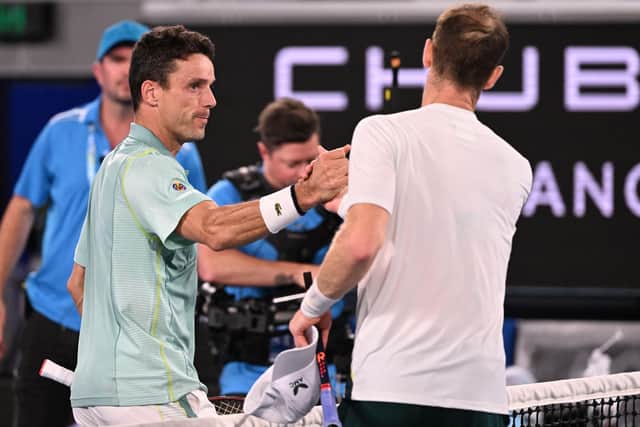 Spain's Roberto Bautista Agut greets Britain's Andy Murray (R) after winning their men's singles match on day six of the Australian Open tennis tournament in Melbourne on January 21, 2023. (Photo by WILLIAM WEST/AFP via Getty Images)