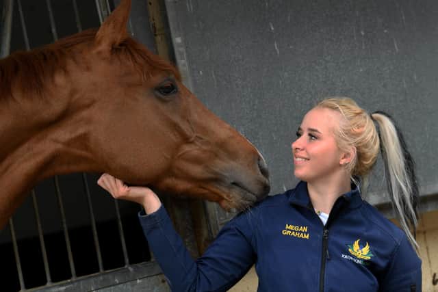 Megan Graham pictured with Racehorse Flamborough who she keeps for at Mark Johnston's Stable Middleham.