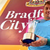DOUBLE WINNER: Andy Cook with his PFA player of the month award for September