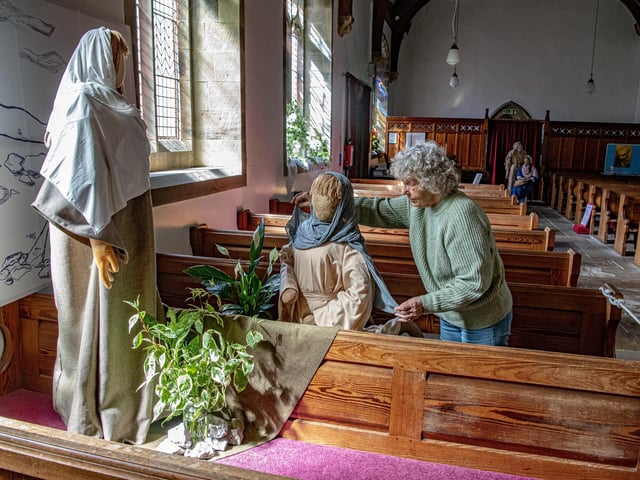 Jean Briggs in St Mary's Church preparing creations.