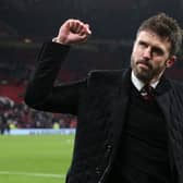 MANCHESTER, ENGLAND - DECEMBER 02:     Manchester United Coach Michael Carrick celebrates at the end of the Premier League match between Manchester United and  Arsenal at Old Trafford on December 2, 2021 in Manchester, England. (Photo by Matthew Peters/Manchester United via Getty Images)