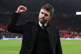 MANCHESTER, ENGLAND - DECEMBER 02:     Manchester United Coach Michael Carrick celebrates at the end of the Premier League match between Manchester United and  Arsenal at Old Trafford on December 2, 2021 in Manchester, England. (Photo by Matthew Peters/Manchester United via Getty Images)
