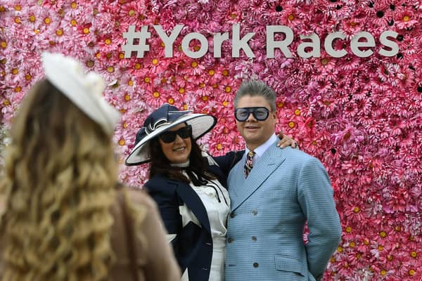 Racegoers at the first day of the Dante Festival at York Racecourse.