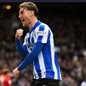 GOOD CALL: Callum Slattery celebrates after putting Sheffield Wednesday 4-0 up (Image: Steve Ellis)