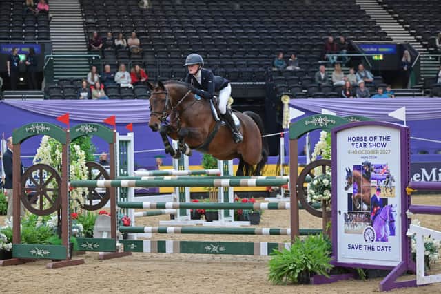Katie Benbow and bay mare Latico display their talent in the International Arena at HOYS..