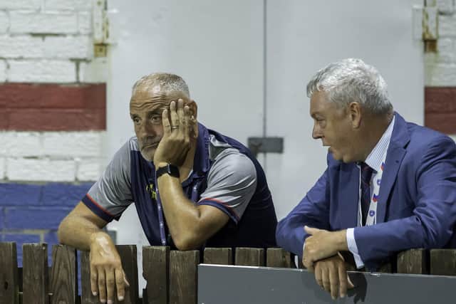 Wakefield CEO Michael Carter, left, shows his dejection with chairman John Minard during the defeat to Catalans. (Photo: Allan McKenzie/SWpix.com)