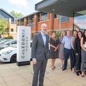 Mark Manning with staff outside new Manning and Stainton offices