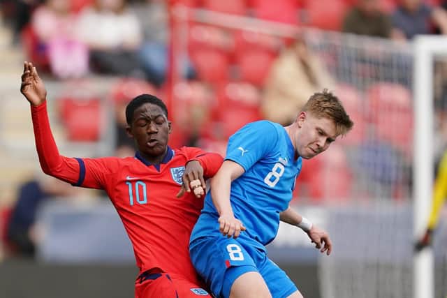 IMPETUS: England Under-19 midfielder Kobbie Mainoo (left) and Iceland Kristian Hlynsson battle for the ball ent of the FA. No editing except cropping.