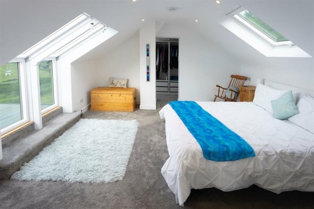 One of the three bedrooms. This one has Velux windows delivering light and views