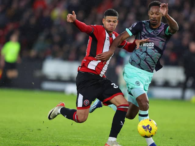 LET'S GET PHYSICAL: Sheffield United's Will Osula tussles with Ethan Pinnock in the 1-0 win over Brentford