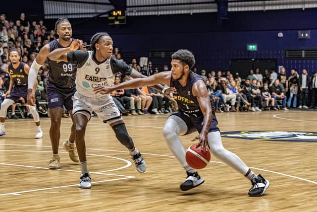 Sharks RJ Eytle-Rock on the dribble as Eagles Devin Whitfield closes in during Sheffield's home opener at the Canon Medical Arena on October 8, 2023 (Picture: Tony Johnson)