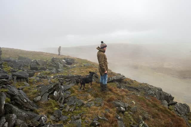 Ingleborough Graziers look for sheep during a gather, as the mist lifts. Image: Rob Fraser/somewhere-nowhere