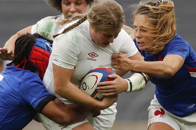 Head down: England's lock Morwenna Talling (C) breaks through against France in the Six Nations (Picture: ADRIAN DENNIS/AFP via Getty Images)