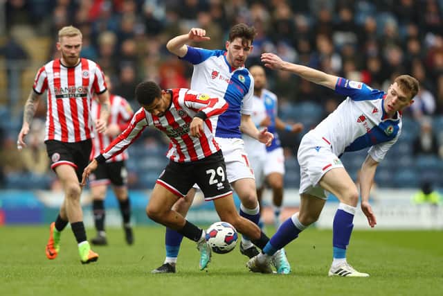 CLOSE CALL: Sheffield United's Iliman Ndiaye (centre-left) and Blackburn Rovers' Joseph Rankin-Costello (centre-right) battle for the ball at Ewood Park Picture: Tim Markland/PA