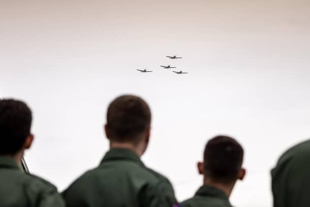 Ukrainian fast jet pilots watching a flypast at their graduation ceremony at the High-G training and test facility at RAF Cranwell. PIC: Andrew Wheeler/UK MOD Crown copyright/PA Wire