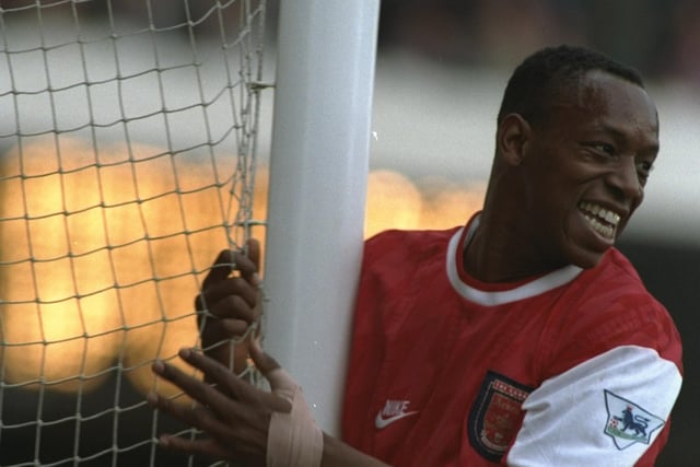 After Paul Merson had put the Gunners 1-0 up at half time, Ian Wright made sure of victory with three goals in nine minutes early in the second half. He is pictured celebrating the second goal at Highbury.